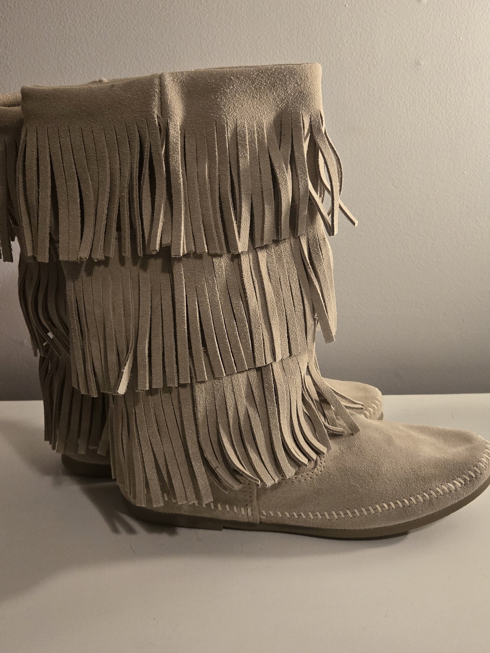 Minnetonka Triple Fringe Suede Moccasin Boots - Beige